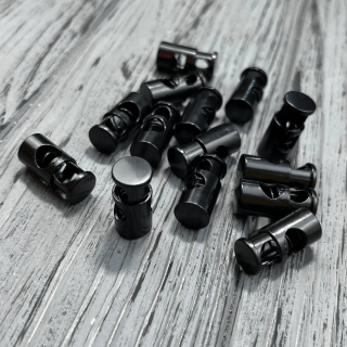 Металлические зажимы фиксаторы на шнурки цвет черный фото