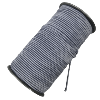 Серая шляпная резинка на катушке фото